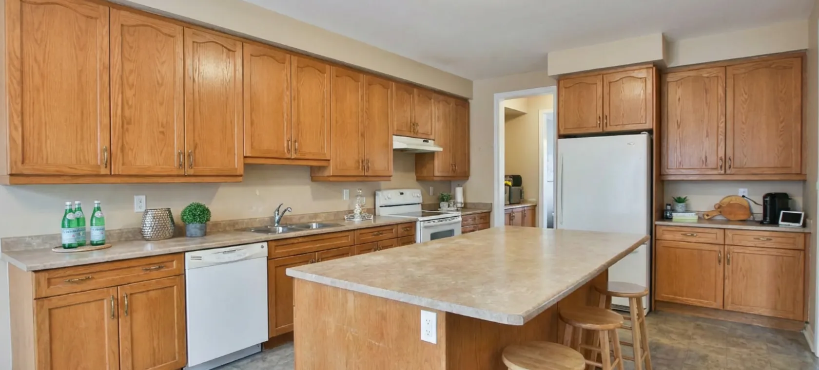 Kitchen remodeling Los Angeles outdated kitchen with wood cabinets and old layout